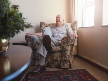 Senior man in chair