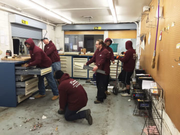 Our movers take care of it all! Our team is safely packaging up the contents of these cabinets.