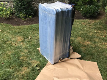 If one of your items needs to be placed somewhere outside of the home during the moving process, we make sure to protect your item from the ground using moving paper.