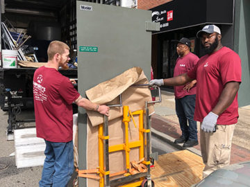 Success! The vault door can now make its way onto the moving truck.