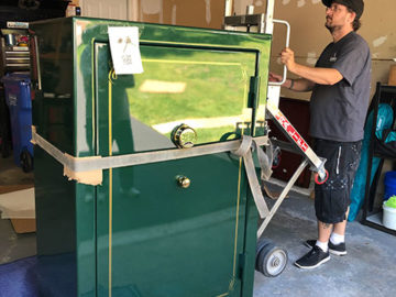 Once our guys hook the safe up to our dolly system, we can safely begin the moving process.